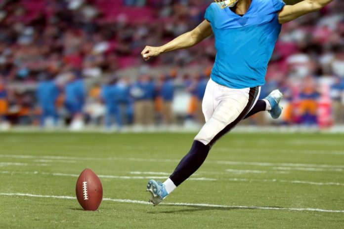 NFL markets American footballer kicking ball