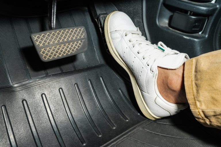 Late acceleration fuels annual recovery for Macau gaming Close up of a foot pressing on an accelerator pedal