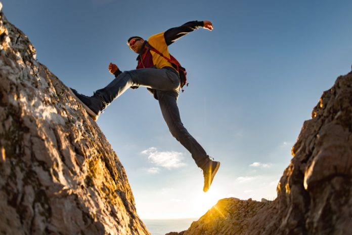 Man taking big step