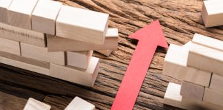 3 Oaks Gaming: 2025 scale proves strict regulation is no barrier to growth arrow breaking through barrier walls