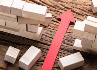 3 Oaks Gaming: 2025 scale proves strict regulation is no barrier to growth arrow breaking through barrier walls
