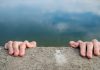 UK charities on a “cliff-edge” amidst funding shake-up Hands holding on to a cliff edge