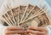 Japan regulator ramps up spending ahead of casino transformation Woman fans out Japanese Yen