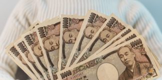 Japan regulator ramps up spending ahead of casino transformation Woman fans out Japanese Yen