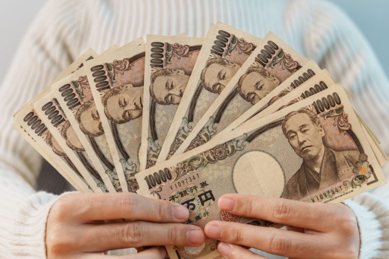 Japan regulator ramps up spending ahead of casino transformation Woman fans out Japanese Yen