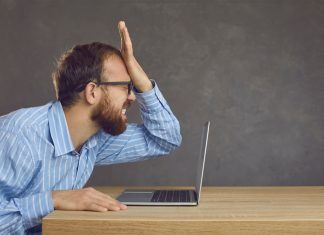 How a legal blunder led to tax exemption for Estonian casinos Man exasperated in front of laptop