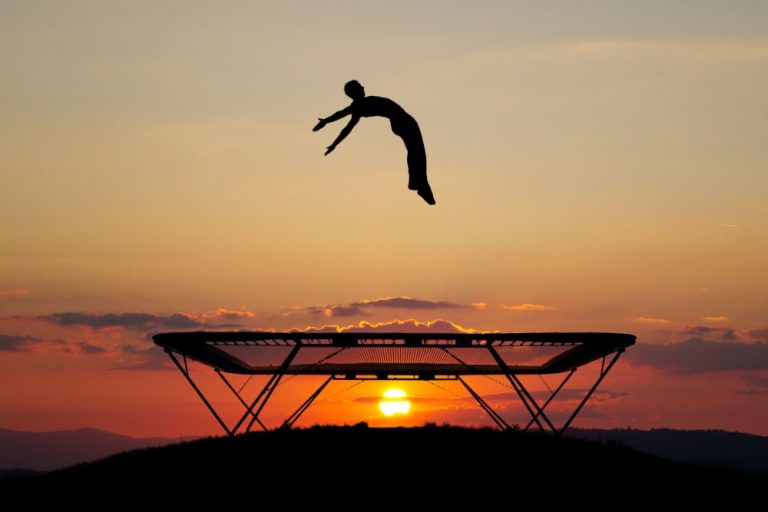 Sports betting bounces back in Denmark silhouette of trampolinist