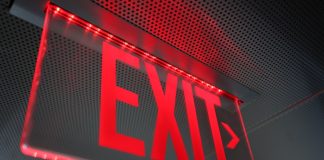 Aristocrat lays out planned exit of interactive white-label business Exit sign