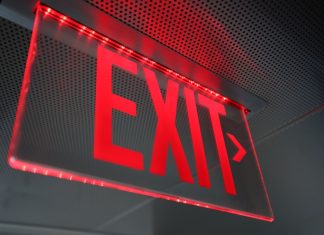 Aristocrat lays out planned exit of interactive white-label business Exit sign
