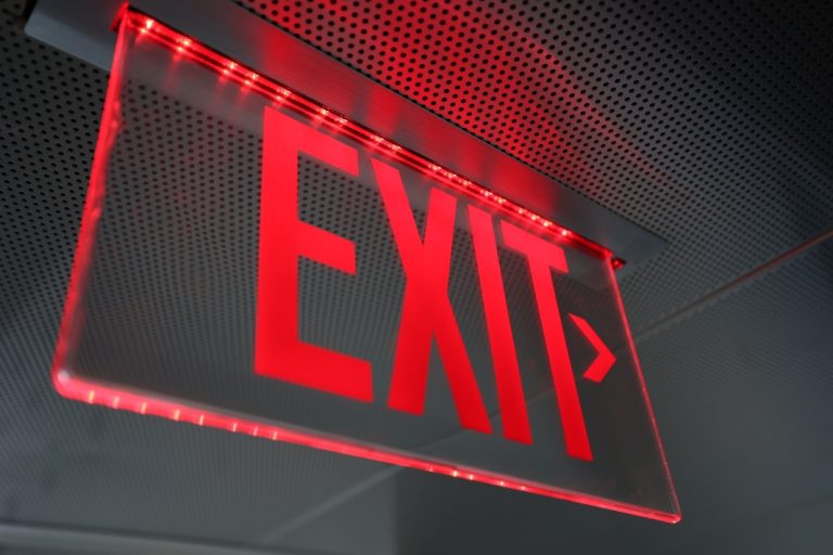 Aristocrat lays out planned exit of interactive white-label business Exit sign