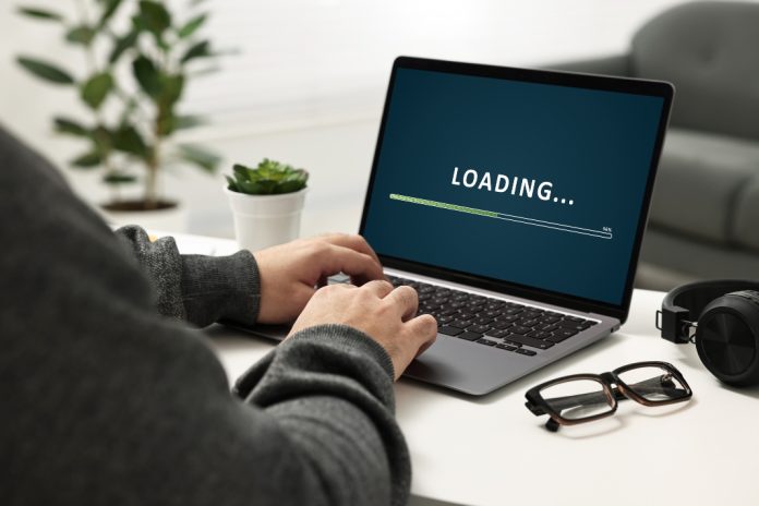 Virginia-iGaming-legislation-progresses-through-committees Loading bar on laptop