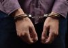 Arrests reveal stark details of Cambodia casino scam centres Man in handcuffs