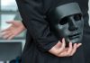 New research pulls back the curtain on deceptive black market tactics Businessman holds mask behind his back