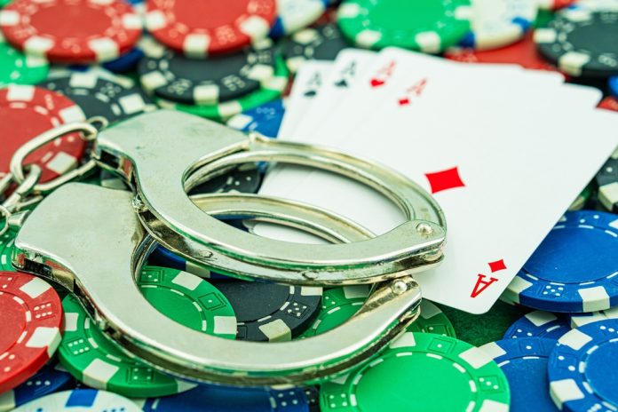 Greece Cards and handcuffs, signalling criminality