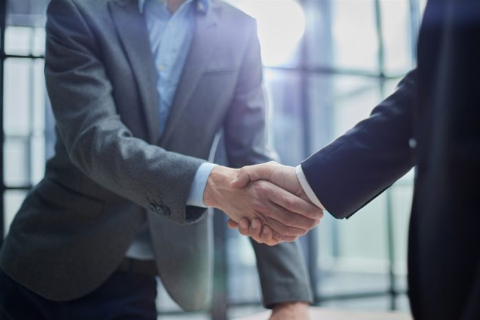 Businessmen shake hands