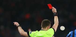 UK Gov to eradicate unlicensed gambling Premier League sponsorship Referee showing a player a red card