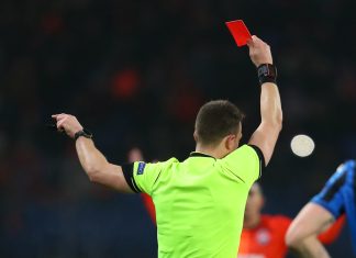 UK Gov to eradicate unlicensed gambling Premier League sponsorship Referee showing a player a red card