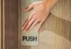 Why affiliates need to push rather than pull in today’s social media age Hand pushing door