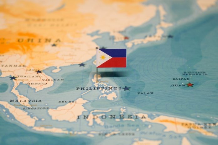A Philippines flag pinned on a map, illustrating Yellow Bat's landmark deal.