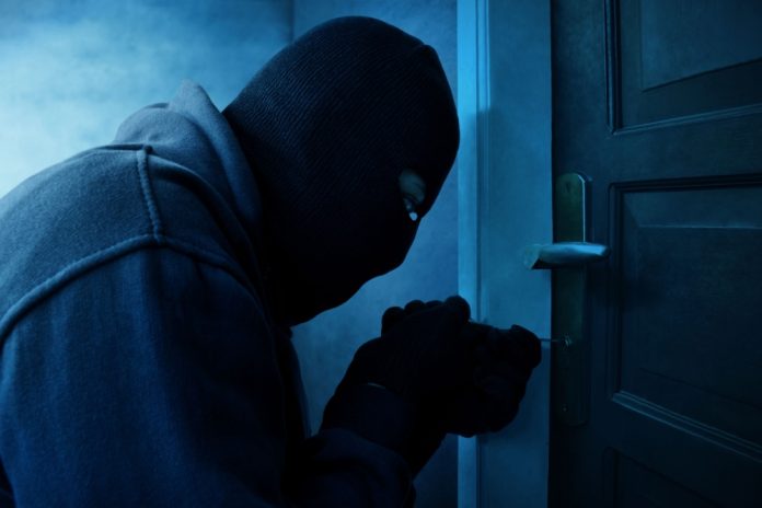Robber opening door