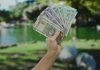 Goa eyes financial boost via major casino fee hike Hand holding Indian rupees