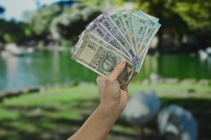 Goa casino licensing Hand holding Indian rupees
