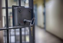 Thai influencer jailed for promoting illegal gambling Key in the lock of a jail cell