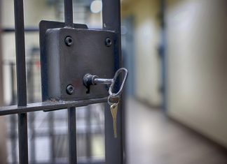 Thai influencer jailed for promoting illegal gambling Key in the lock of a jail cell