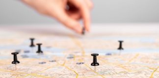Soft2Bet lays out Alberta roadmap ahead of expansion Hand putting pins in a roadmap