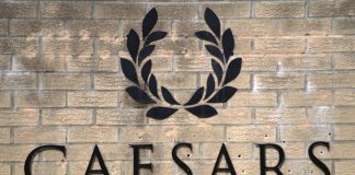 Where things stand with Caesars Entertainment and Tilman Fertitta takeover talks Caesars Entertainment logo
