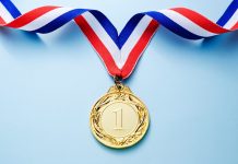 Infingame: cementing a leadership position in casino aggregation Gold Medal on blue background