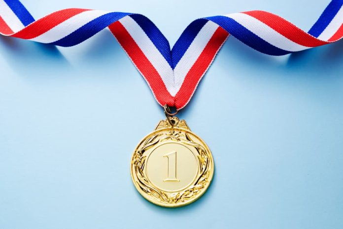 Gold-Medal Gold Medal on blue background