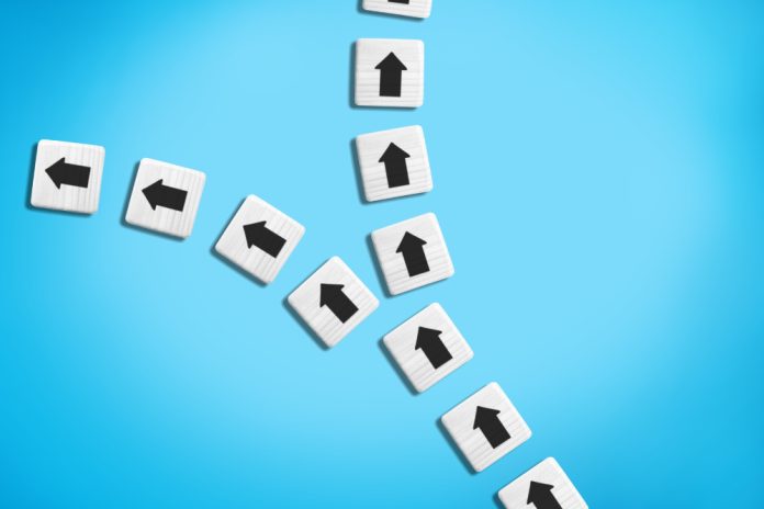 Iconic21 An arrow line splits to illustrate Iconic21 reflection on iGaming decisions.