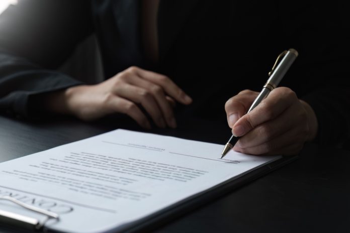 Contract being signed
