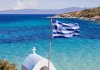 Greek gambling regulator empowered in black market battle Greek flag with ocean in background
