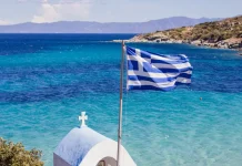 Greek gambling regulator empowered in black market battle Greek flag with ocean in background