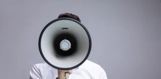Gambling Commission ‘increasingly vocal’ against companies failing in black market fight Close up of a man shouting through a megaphone