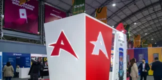 Ainsworth ends hunt for new CEO with familiar face AGT's logo on a stand at an event