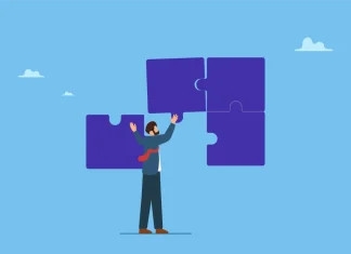 Kanggiten: Where operators lose players and how platform architecture can stop the bleed A man fixing puzzle pieces, illustrating Kanggiten and their PAM strategy.