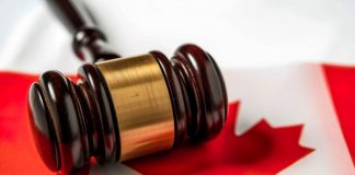 Ontario’s AGCO penalises Relax Gaming and Pragmatic Play for unregulated market presence Gavel with Canadian flag