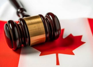Ontario’s AGCO penalises Relax Gaming and Pragmatic Play for unregulated market presence Gavel with Canadian flag