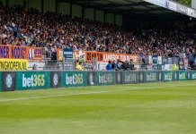 bet365 steps up Blueprint Gaming partnership with free spins promotion Bet365 logo on football hoardings