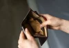 Philippines iGaming feels the pinch of Middle East tensions Hand opening an empty wallet