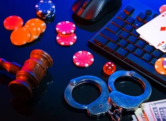 Is illegal gambling moving away from Cambodia amid government crackdown? Handcuffs and poker chips