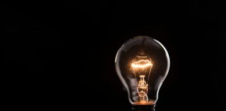 EdgeLabs: We Don’t Gamble on Growth. We Innovate It. lightbulb on black background