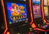 Labor urged to slash the number of pokies in New South Wales Close up of pokies machine