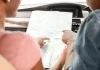 The roadmap for Veikkaus following new CFO appointment Couple looking at a map in a car