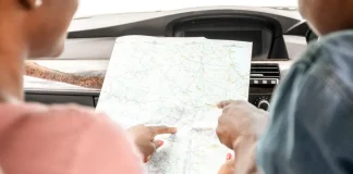The roadmap for Veikkaus following new CFO appointment Couple looking at a map in a car