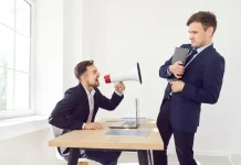 KSA reprimands Betnation for ‘highly reprehensible’ self-exclusion failures Person shouting through loudspeaker at someone else