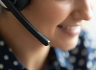 PAGCOR orders advertising overhaul to include gambling helpline Woman working in call centre